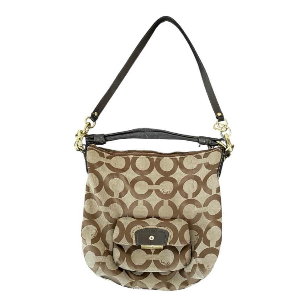 Elegant Brown and Beige Coach Shoulder Bag with Circular Pattern